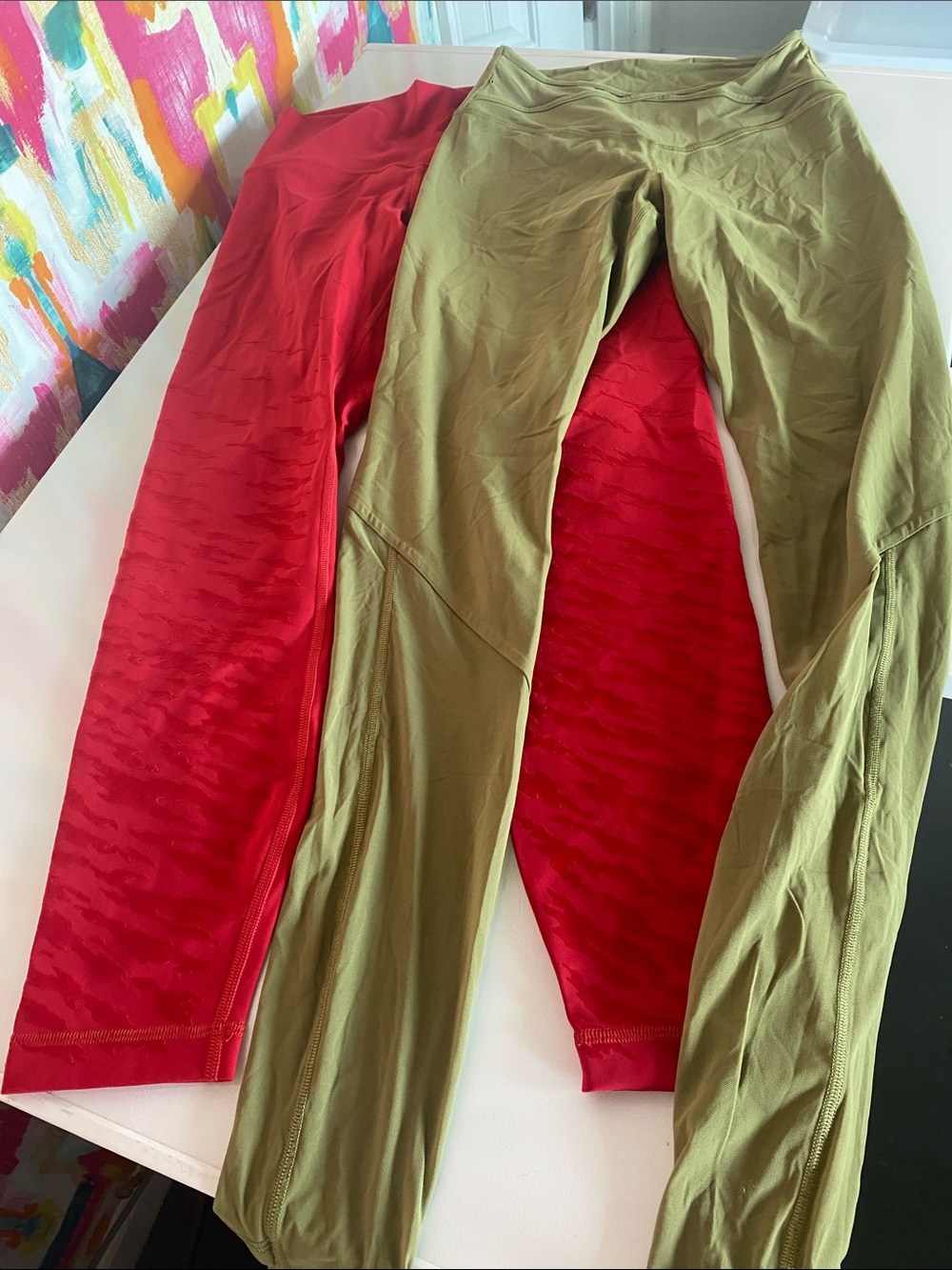 2 pairs Lulu Active Leggings. Size 6. Red is cropped. In really good condition.